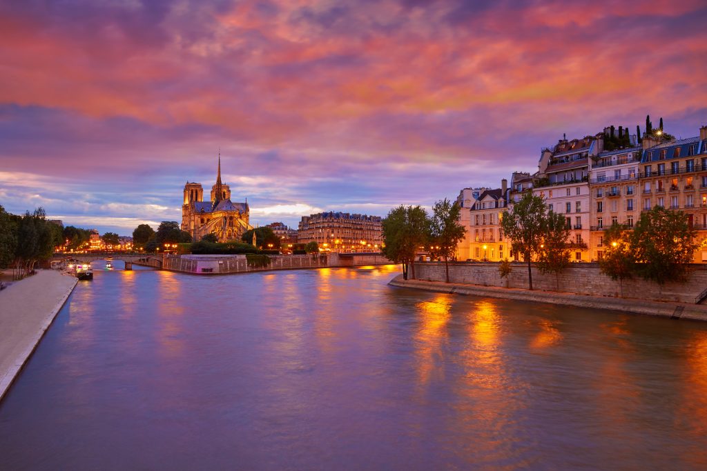 Notre Dame cathedral Paris sunset at Seine